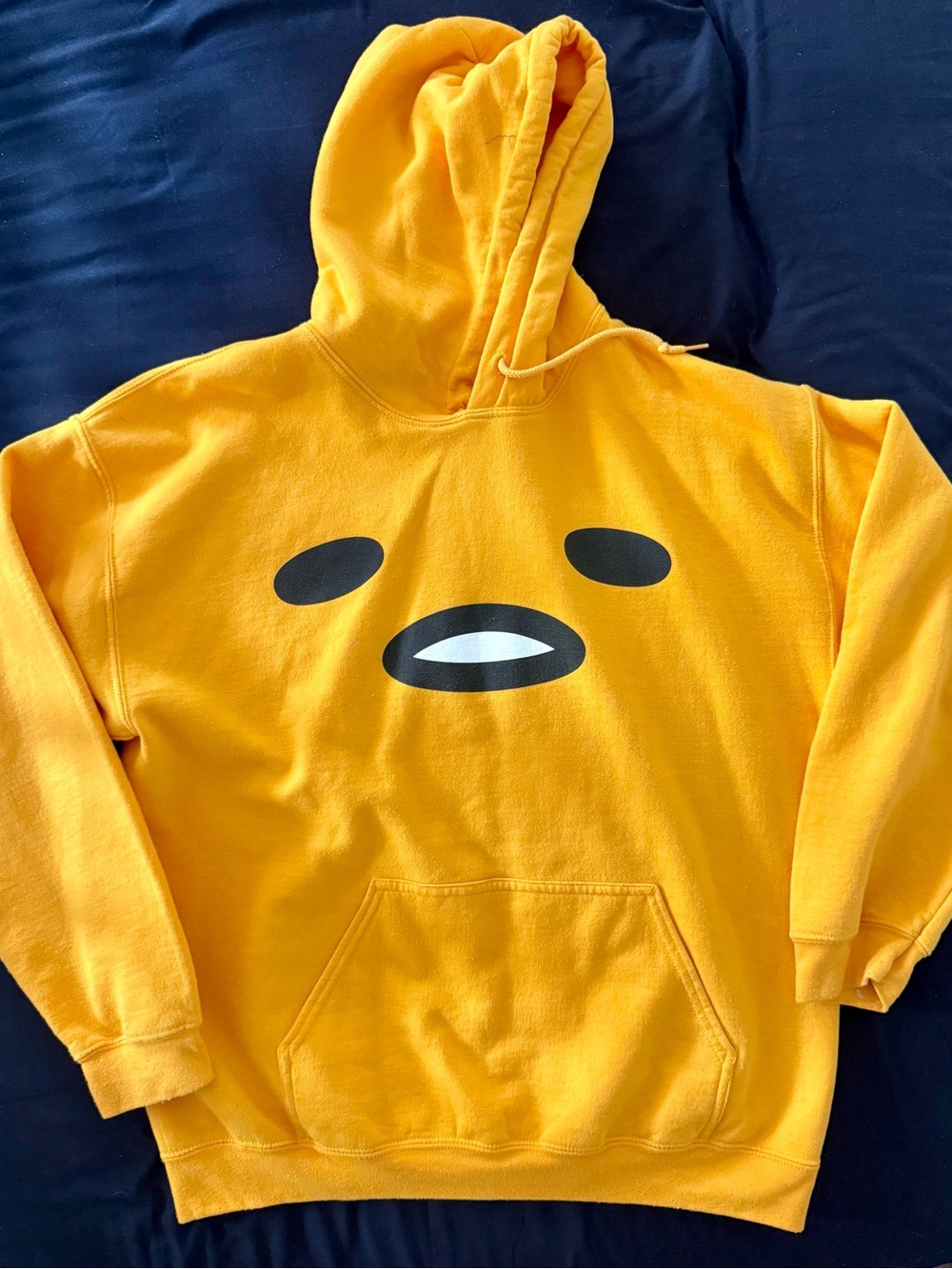 Sanrio Gudetama Kids Hoodie in Bright Yellow with Black & White Face